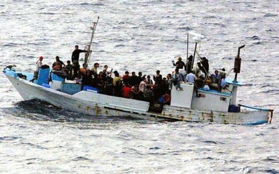 What is the right to asylum? Picture of people on a ship on the ocean