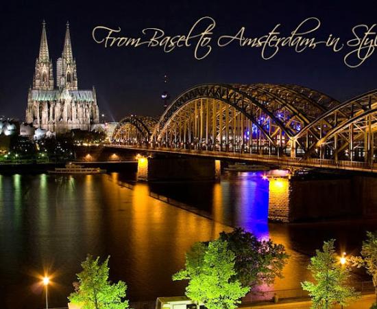 Cologne, Germany at night with the bridge lit up